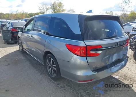 2021 Honda Odyssey Touring from USA, damaged, VIN 5FNRL6H85MB042750